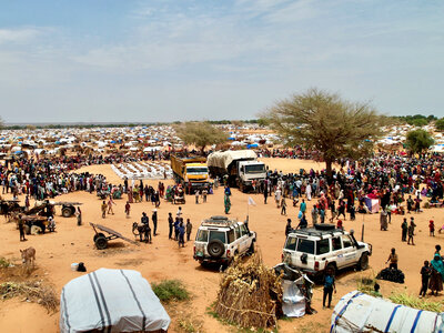 Photo: WFP/Julian Civiero Aerial view of Adré camp in Chad whereWFP trucks await unloading for the distribution of food to Sudanese refugees.
