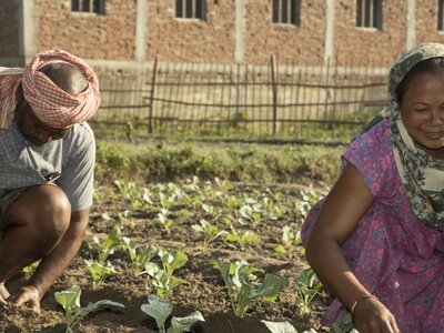 Photo: WFP/Santosh Shahi Man and woman working on a field