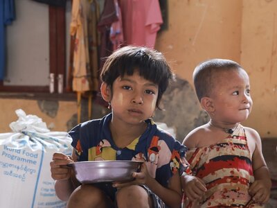 Photo: WFP/Su Myat Yadanar A family from Sittwe township, Rakhine State enjoys lunch with food assistance provided by WFP in the immediate aftermath of Cyclone Mocha.