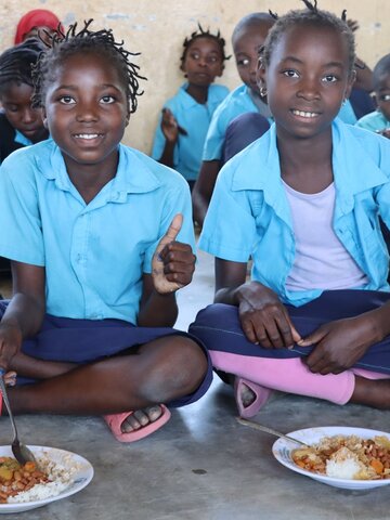 Two children benefiting from school meals programme in Nampula, Mozambique. © WFP/Ana Mato Hombre