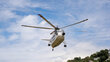 An UNHAS helicopter prepares to land in Port-au-Prince, which is all but cut off from the rest of Haiti without air service. WFP/Pedro Rodrigues