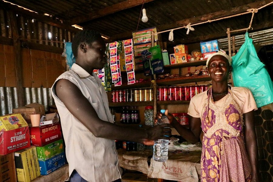 Magret Achi's business is booming thanks to the new road running through her village. Photo: WFP Musa Mahadi.