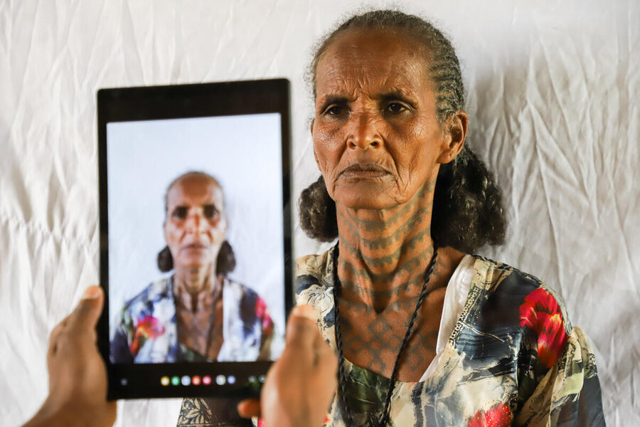 Letebrehan Kahisay, 54 a mother of 8 screened at the identification and Digital registration center in &nbsp;Asgede wereda, May Feres kebelle , Adi-Mesie village.