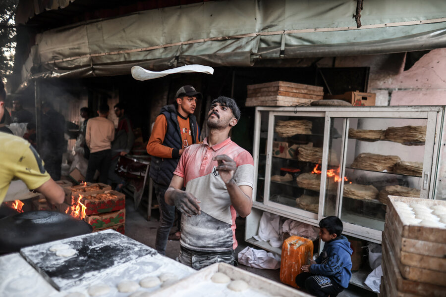 Gazans who can do so exchange wheat flour for traditional 'Saj" flatbread. Despite skyrocketing hunger, many people are fasting and eating only after sunset during this holy Muslim month of Ramadan. &nbsp;Photo: WFP/Ali Jadallah