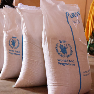 WFP-branded bags containing white cowpea purchased from smallholder farmers