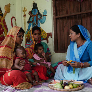 women are having meals with their children
